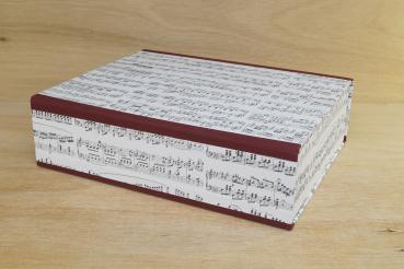 Large box with burgundy linen edges and musical notes motif